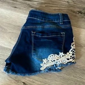 Bongo Dark Jean Shorts Size 5 with floral decorations